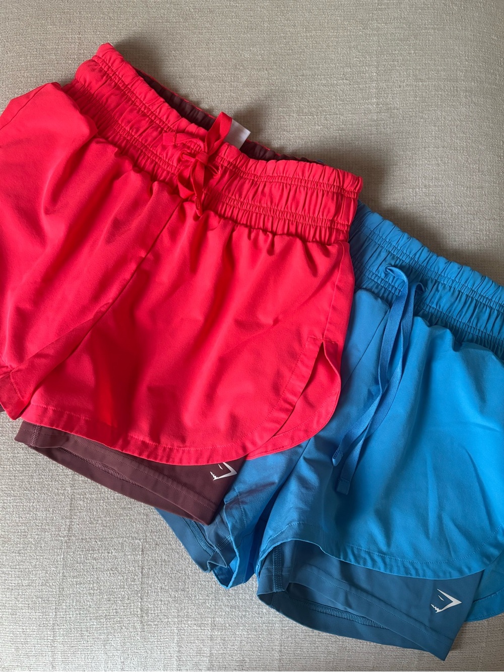 Gymshark Women’s Athletic Shorts in Hot Pink and Sky Blue
